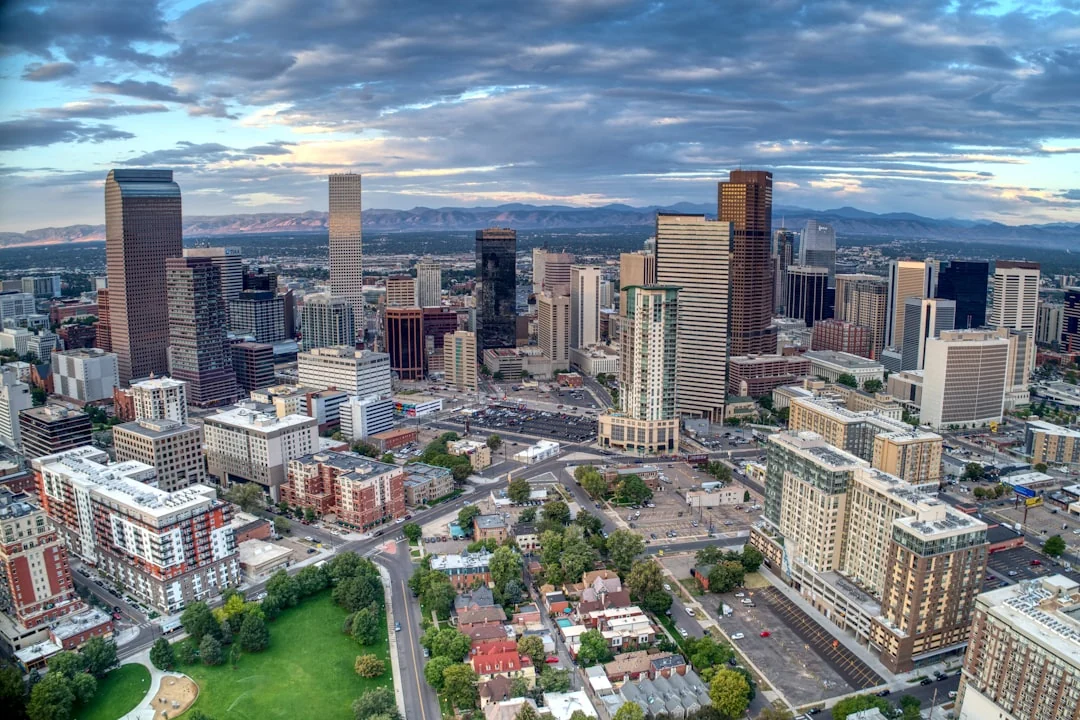 Downtown Denver, Colorado with the Rocky Mountains in the distance Downtown Denver, Colorado with the Rocky Mountains in the distance