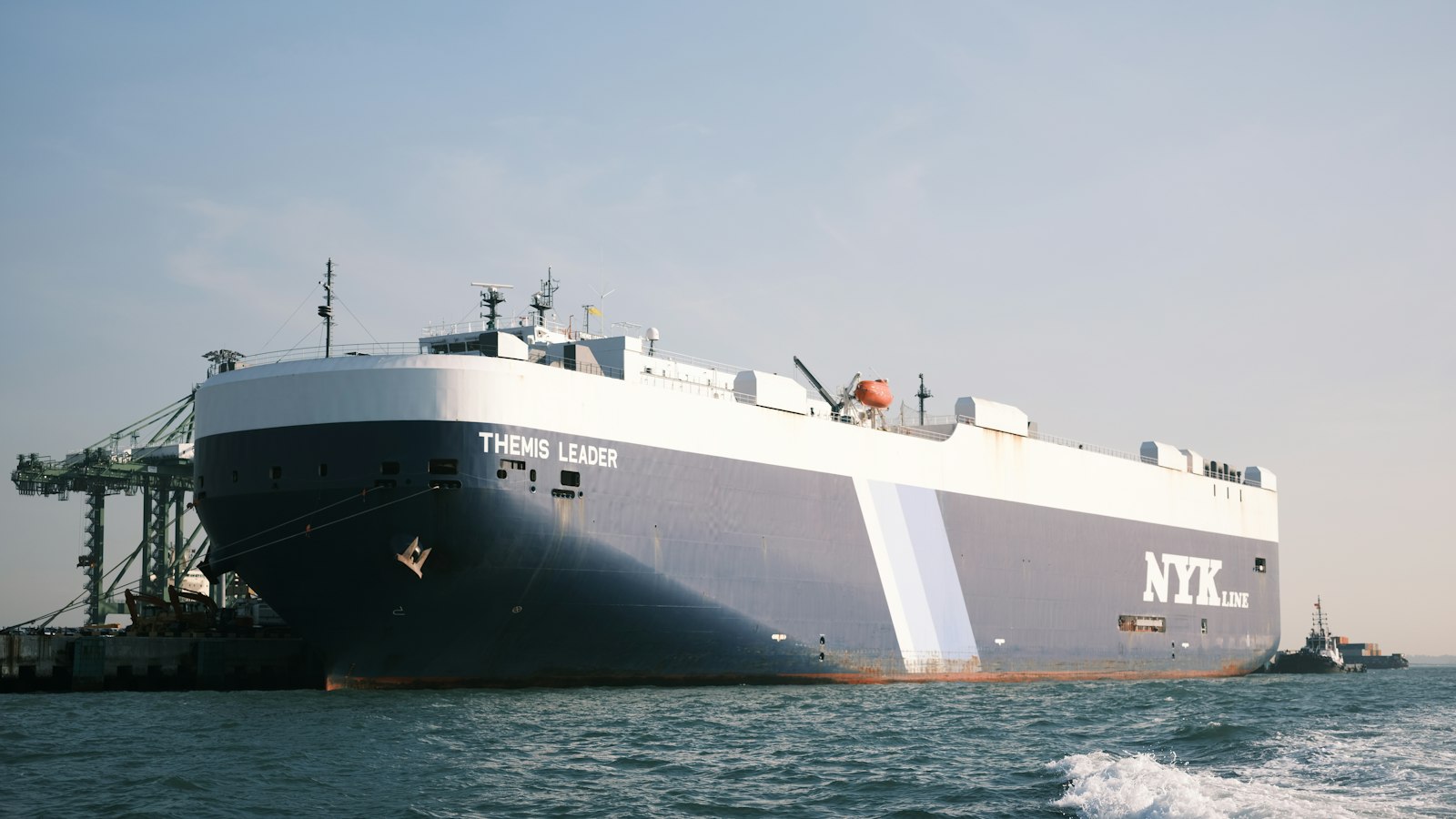 Car carrier ship crossing the ocean with vehicles shipped internationally from the USA