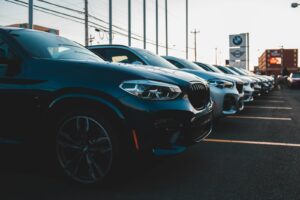Row of used cars on a lot, the kind of inventory listed on used car websites