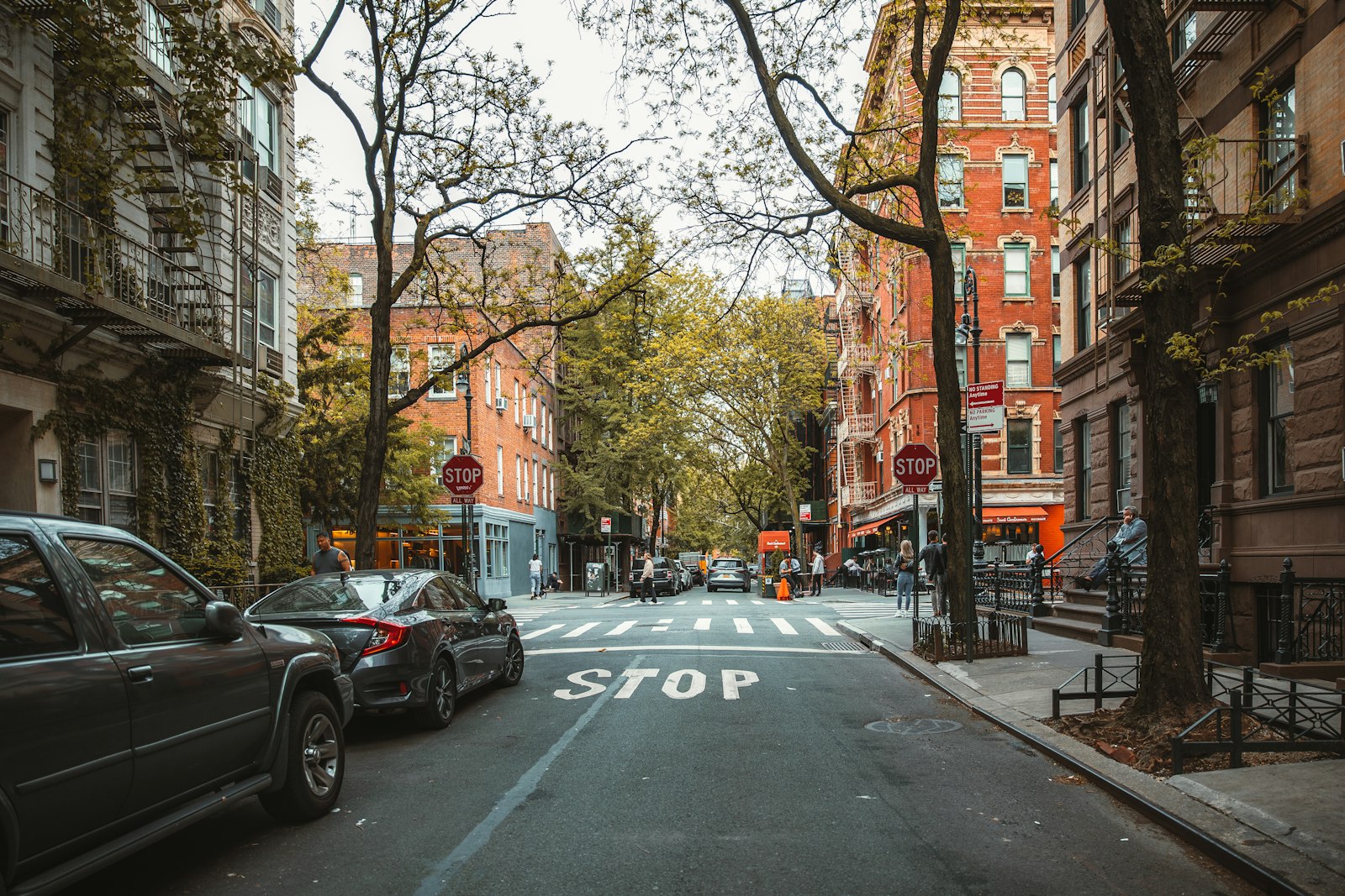 Cars parked along a New York City street with alternate-side parking