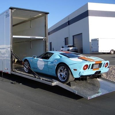 Low-clearance car loading into an enclosed trailer — Pensacola car shipping guide Low-clearance car loading into an enclosed trailer — Pensacola car shipping guide